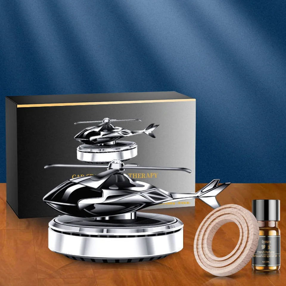 Difusor de aroma con forma de helicóptero sobre una base circular